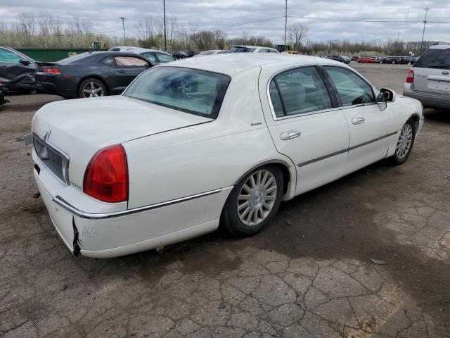 Photo 3 from auction – 2003 LINCOLN TOWN CAR E with VIN 1LNHM81W03Y685000