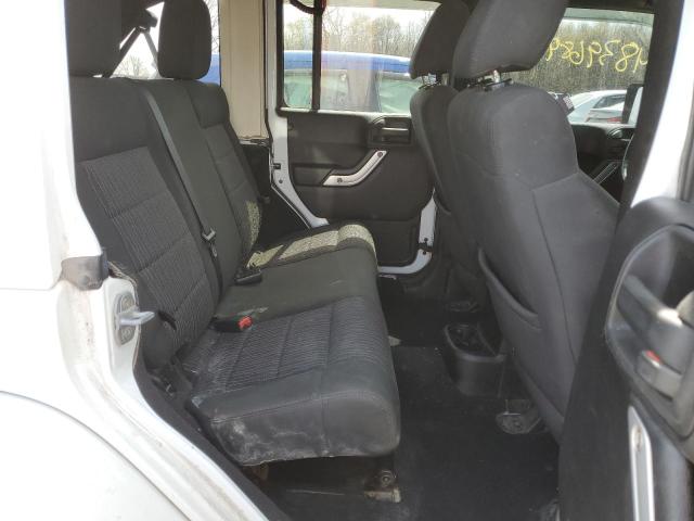 Photo 11 from auction – 2011 JEEP WRANGLER U with VIN 1J4HA5H12BL609175