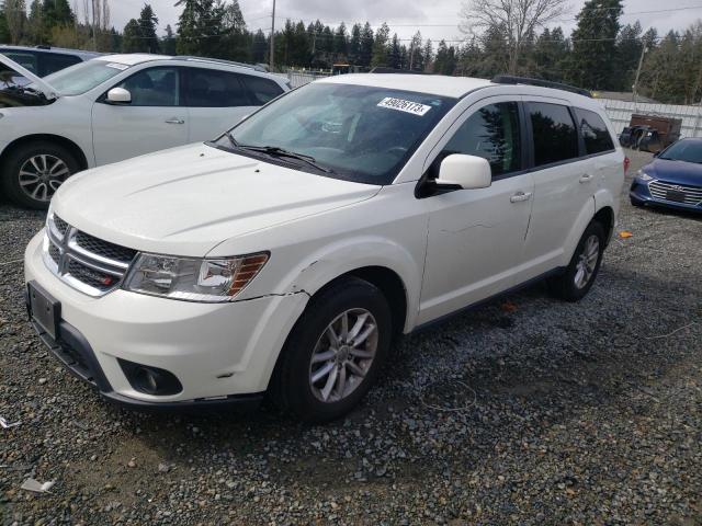 DODGE JOURNEY SX 2013 with VIN 3C4PDDBGXDT571184 - Photo from auction
