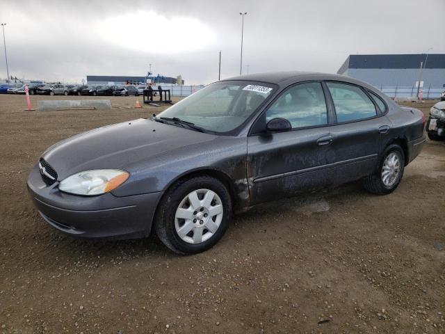 FORD TAURUS LX 2002 with VIN 1FAFP52U22G121616 - Photo from auction