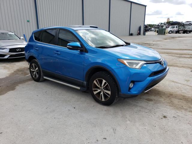 Photo 4 from auction – 2016 TOYOTA RAV4 XLE with VIN JTMWFREV1GJ089891