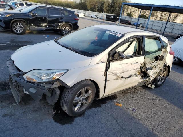 FORD FOCUS SE 2014 with VIN 1FADP3K26EL198463 - Photo from auction