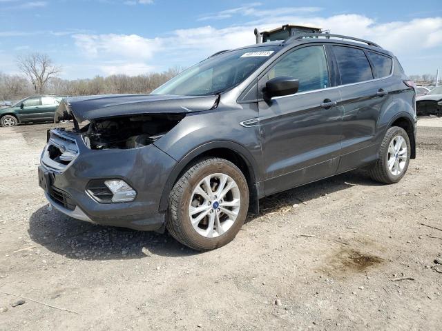 FORD ESCAPE SE 2018 with VIN 1FMCU9GD4JUA29148 - Photo from auction