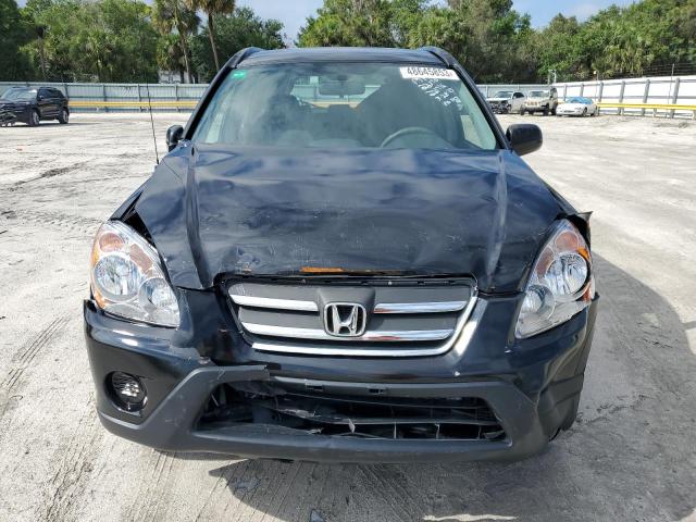 Photo 5 from auction – 2005 HONDA CR-V LX with VIN JHLRD68545C016662