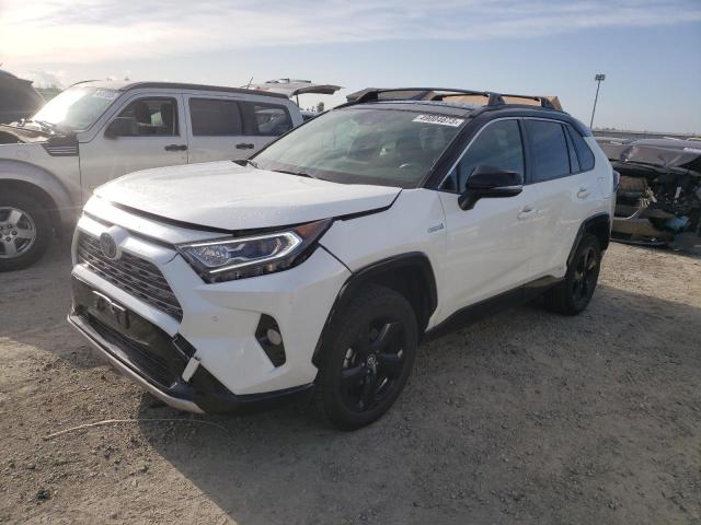 TOYOTA RAV4 XSE 2019 with VIN JTMEWRFV6KD516404 - Photo from auction