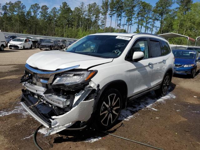 HONDA PILOT TOUR 2022 with VIN 5FNYF6H91NB016823 - Photo from auction