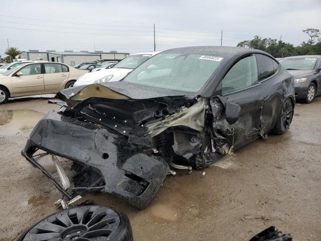 TESLA MODEL Y 2022 with VIN 7SAYGDEF4NF446196 - Photo from auction