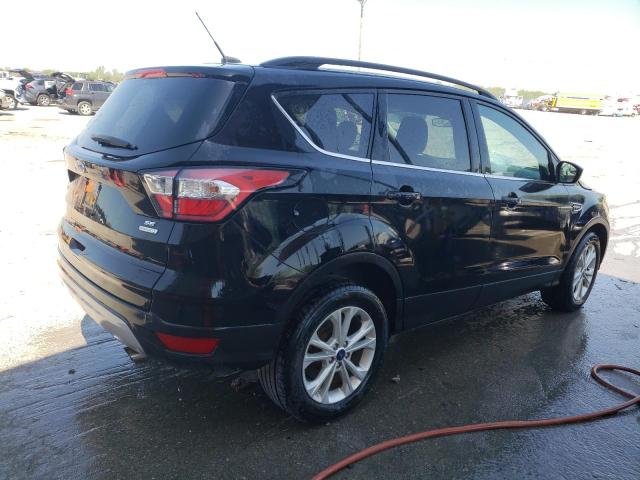 Photo 3 from auction – 2018 FORD ESCAPE SE with VIN 1FMCU0GD1JUB08384