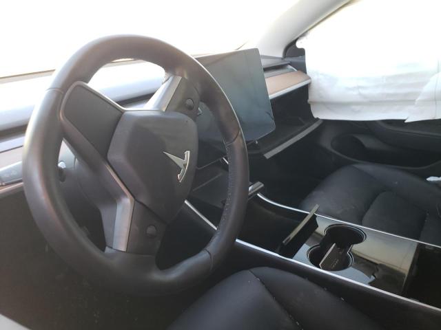 Photo 9 from auction – 2018 TESLA MODEL 3 with VIN 5YJ3E1EB9JF073594