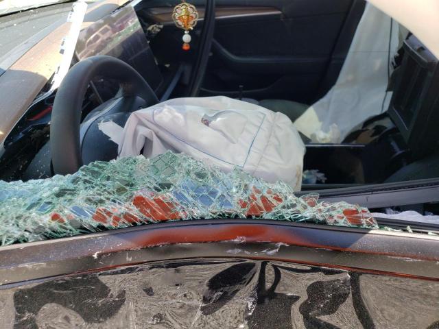 Photo 7 from auction – 2023 TESLA MODEL 3 with VIN 5YJ3E1EA1PF469664