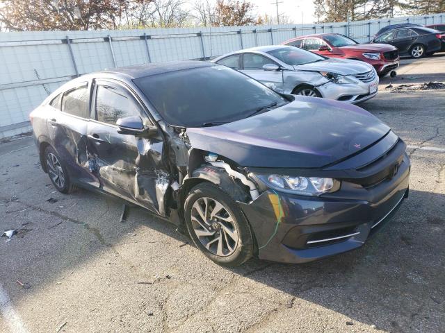 Photo 4 from auction – 2018 HONDA CIVIC EX with VIN 19XFC2F79JE015736