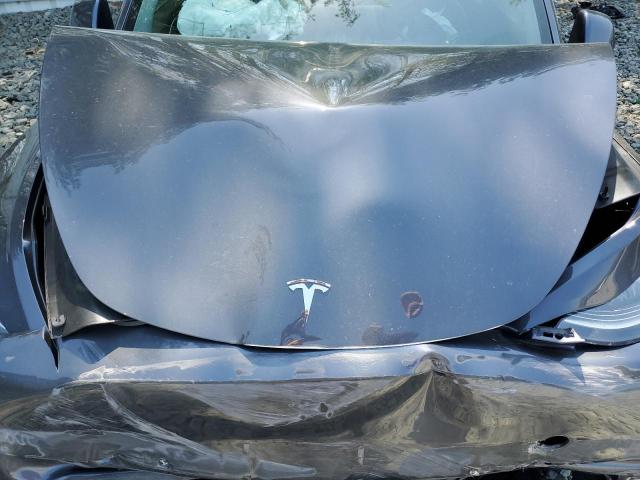 Photo 11 from auction – 2021 TESLA MODEL Y with VIN 5YJYGDEE7MF074842