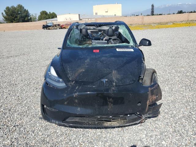 Photo 5 from auction – 2021 TESLA MODEL Y with VIN 5YJYGDEE1MF194278