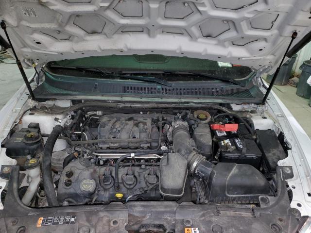 Photo 11 from auction – 2015 FORD TAURUS POL with VIN 1FAHP2MK2FG178472