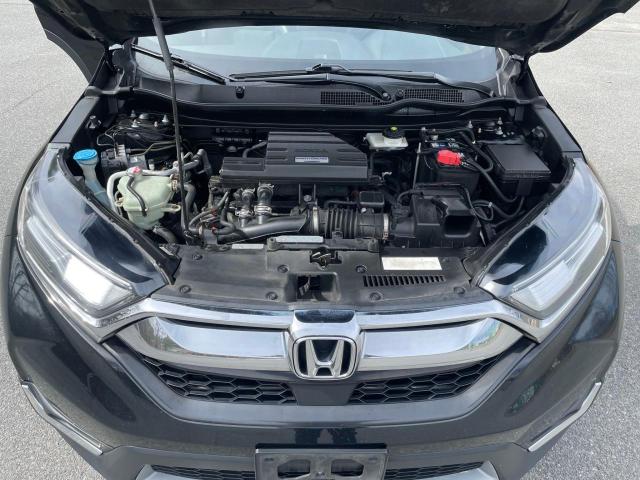 Photo 7 from auction – 2018 HONDA CR-V TOURI with VIN 7FARW2H99JEH4409