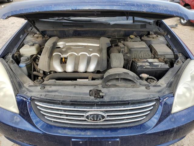 Photo 11 from auction – 2006 KIA OPTIMA LX with VIN KNAGE123965023427