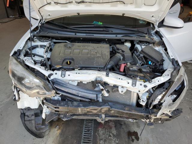 Photo 11 from auction – 2014 TOYOTA COROLLA L with VIN 2T1BURHE6EC213629