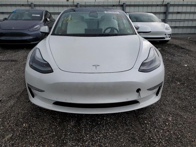 Photo 5 from auction – 2021 TESLA MODEL 3 with VIN 5YJ3E1EA4MF047755