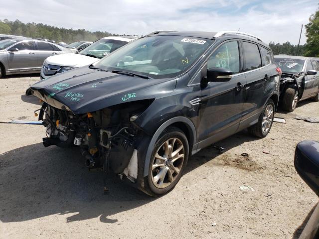 FORD ESCAPE TIT 2014 with VIN 1FMCU0J95EUD59676 - Photo from auction
