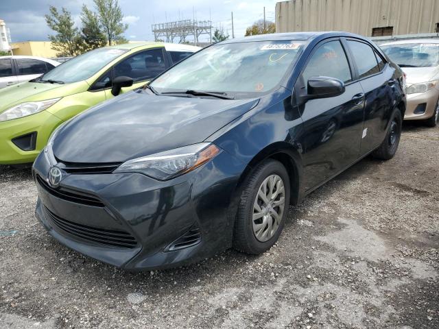 TOYOTA COROLLA L 2017 with VIN 2T1BURHE2HC915242 - Photo from auction
