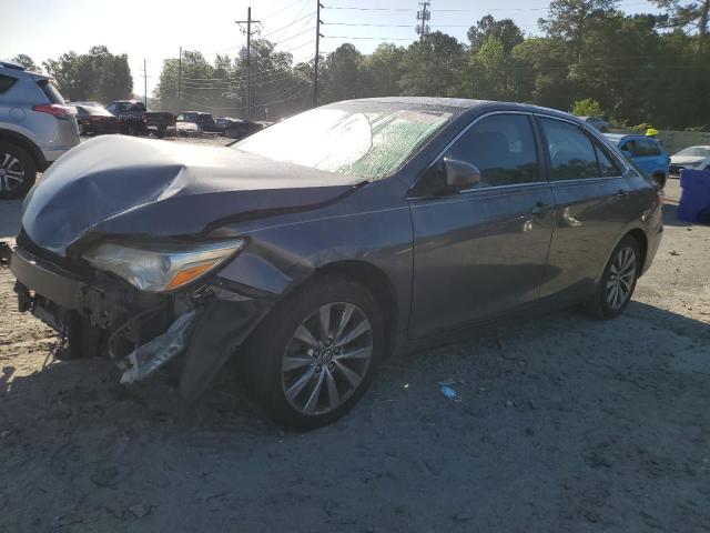 TOYOTA CAMRY LE 2016 with VIN 4T4BF1FK4GR567998 - Photo from auction