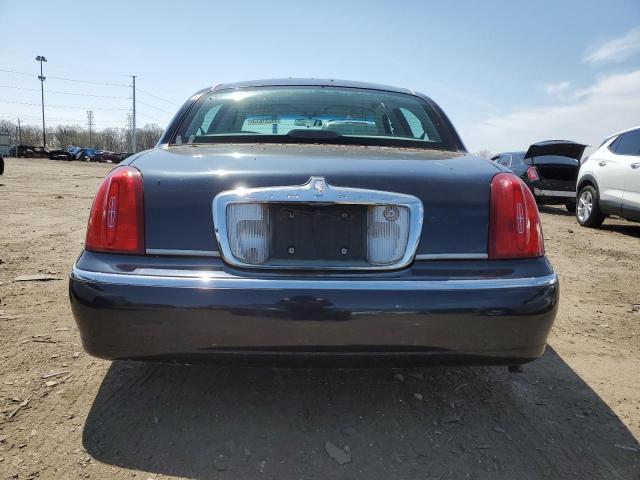 Photo 6 from auction – 1999 LINCOLN TOWN CAR E with VIN 1LNHM81W7XY669205