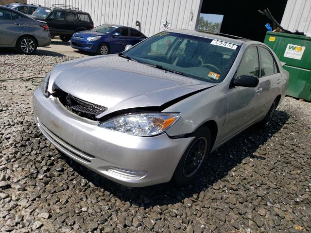 TOYOTA CAMRY LE 2003 with VIN JTDBE32K230158869 - Photo from auction