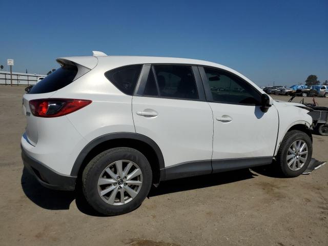 Photo 3 from auction – 2013 MAZDA CX-5 SPORT with VIN JM3KE2BE1D0167320
