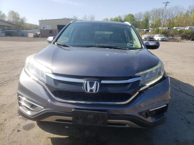 Photo 5 from auction – 2016 HONDA CR-V EXL with VIN 5J6RM4H7XGL055580