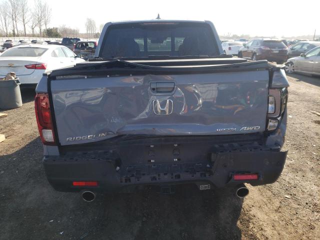 Photo 6 from auction – 2022 HONDA RIDGELINE with VIN 5FPYK3F76NB501722