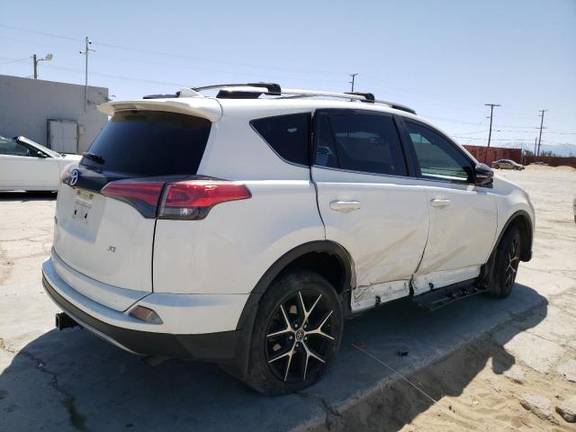 Photo 3 from auction – 2017 TOYOTA RAV4 SE with VIN JTMNFREVXHJ114221