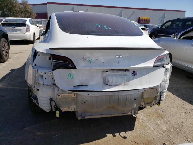 Photo 6 from auction – 2018 TESLA MODEL 3 with VIN 5YJ3E1EA9JF011233