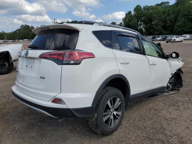 Photo 3 from auction – 2017 TOYOTA RAV4 XLE with VIN JTMWFREV8HJ700954