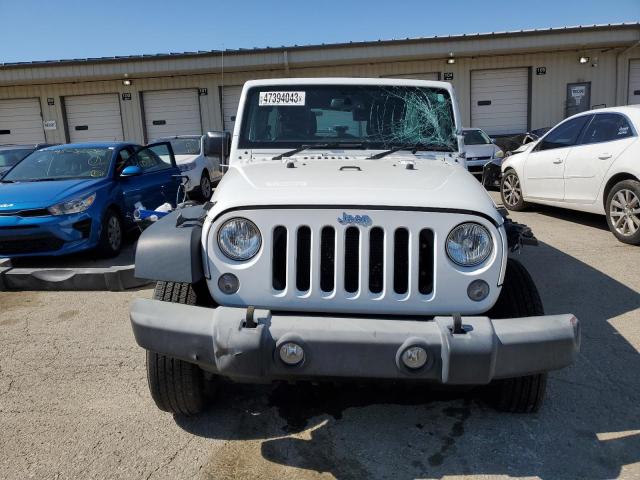 Photo 5 from auction – 2016 JEEP WRANGLER U with VIN 1C4BJWKG7GL325627