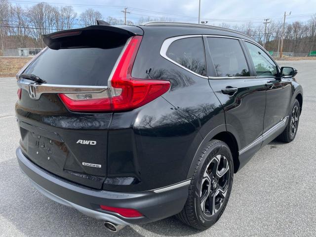 Photo 4 from auction – 2018 HONDA CR-V TOURI with VIN 7FARW2H99JEH14409