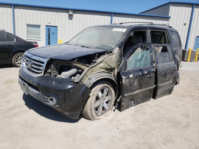 HONDA PILOT TOUR 2014 with VIN 5FNYF4H97EB008228 - Photo from auction