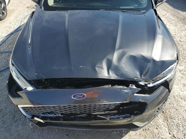 Photo 11 from auction – 2019 FORD FUSION TIT with VIN 3FA6P0D99KR105093