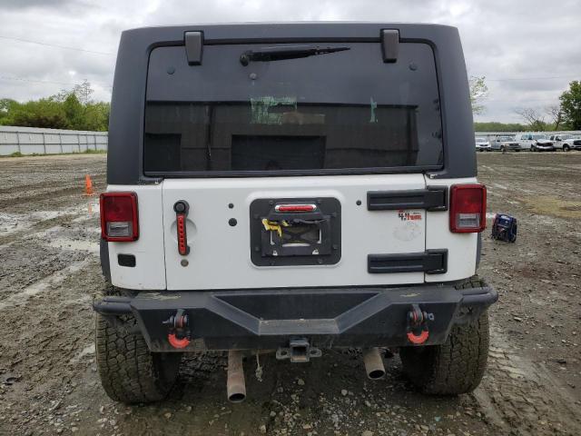 Photo 6 from auction – 2011 JEEP WRANGLER S with VIN 1J4AA5D13BL560186