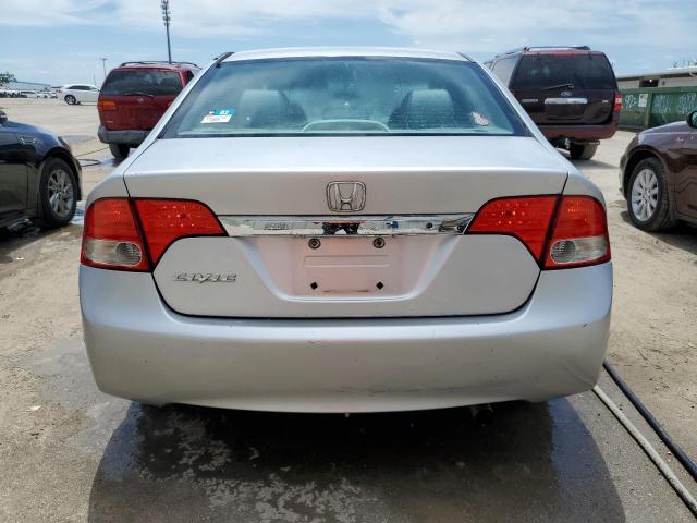 Photo 6 from auction – 2011 HONDA CIVIC LX with VIN 19XFA1F53BE011066