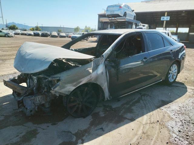 Photo 1 from auction – 2012 TOYOTA CAMRY HYBR with VIN 4T1BD1FK4CU060948