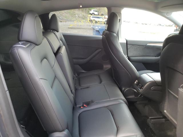 Photo 10 from auction – 2023 TESLA MODEL Y with VIN 7SAYGAEE7PF628581