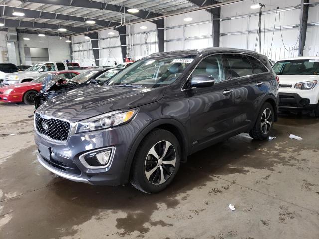 KIA SORENTO EX 2016 with VIN 5XYPHDA15GG033358 - Photo from auction