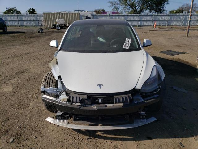 Photo 5 from auction – 2021 TESLA MODEL 3 with VIN 5YJ3E1EB3MF936717