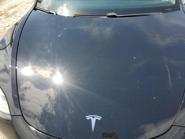 Photo 11 from auction – 2018 TESLA MODEL 3 with VIN 5YJ3E1EA8JF028024