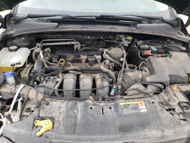 Photo 11 from auction – 2013 FORD FOCUS SE with VIN 1FADP3K26DL334105