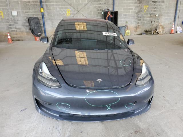 Photo 5 from auction – 2018 TESLA MODEL 3 with VIN 5YJ3E1EA1JF004048