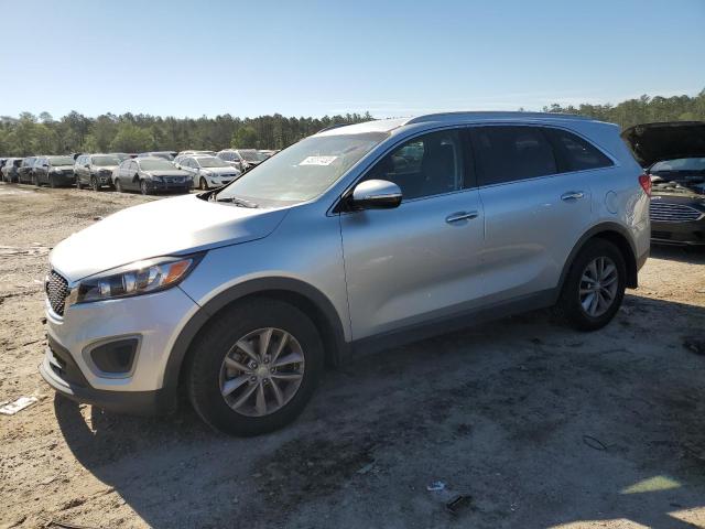 KIA SORENTO LX 2016 with VIN 5XYPG4A33GG151767 - Photo from auction