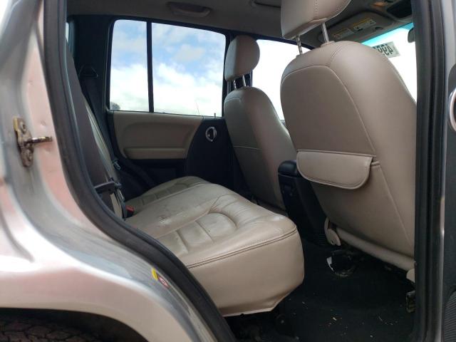 Photo 10 from auction – 2003 JEEP LIBERTY LI with VIN 1J8GL58K13W640253