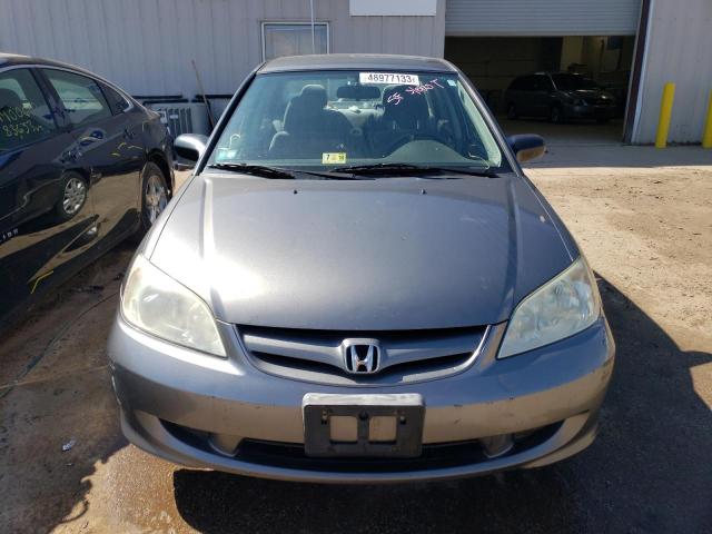 Photo 5 from auction – 2004 HONDA CIVIC LX with VIN 2HGES16534H609353
