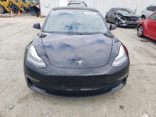Photo 5 from auction – 2021 TESLA MODEL 3 with VIN 5YJ3E1EC4MF061088